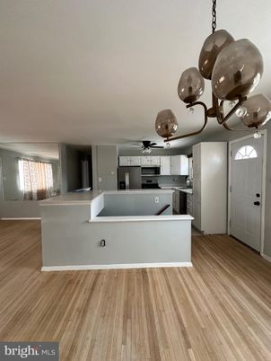 Interior, Kitchen, Pendant Lights, Stainless Steel Appliances, Wood Texture Flooring