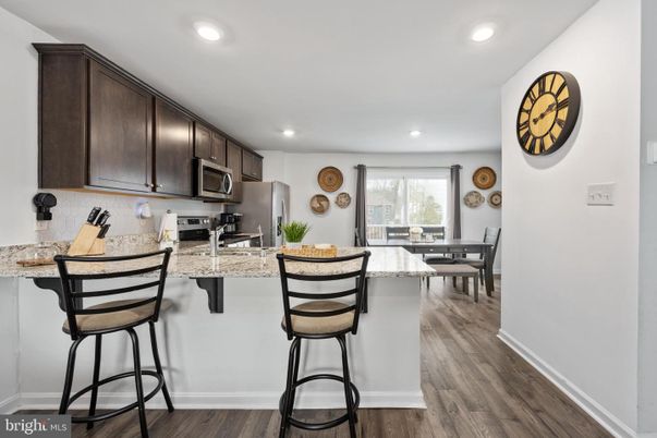Dining room, Interior, Kitchen, Recessed Lighting, Stainless Steel Appliances, Wood Texture Flooring