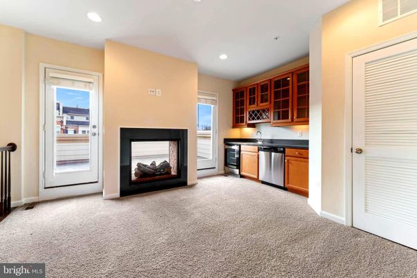 Fireplace, Interior, Kitchen, Recessed Lighting, Stainless Steel Appliances
