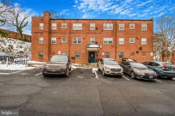 Exterior, Facade, Brick Facade, Condo Building