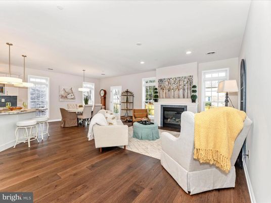Dining room, Fireplace, Interior, Living room, Pendant Lights, Recessed Lighting, Wood Texture Flooring