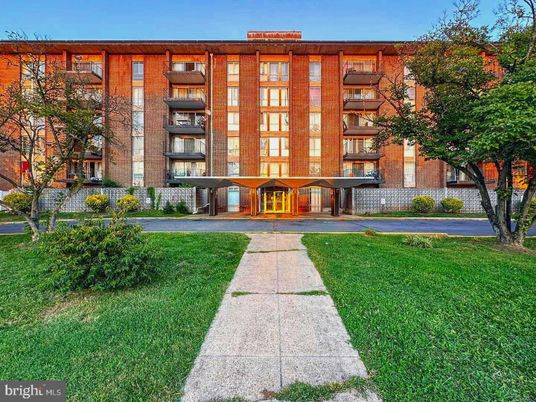Backyard, Exterior, Facade, Brick Facade, Condo Building