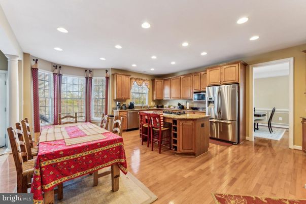 Dining room, Interior, Kitchen, Recessed Lighting, Stainless Steel Appliances, Wood Texture Flooring