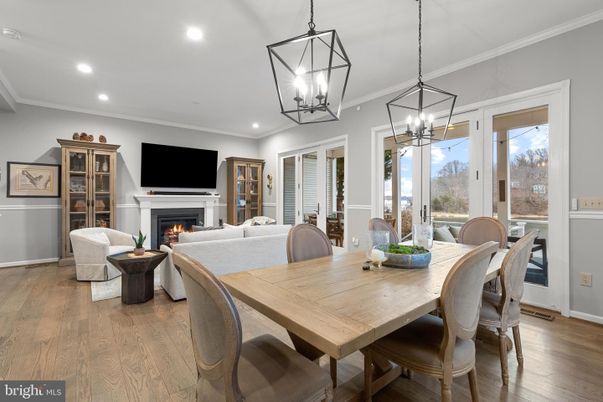 Dining room, Fireplace, Interior, Living room, Pendant Lights, Recessed Lighting, Wood Texture Flooring