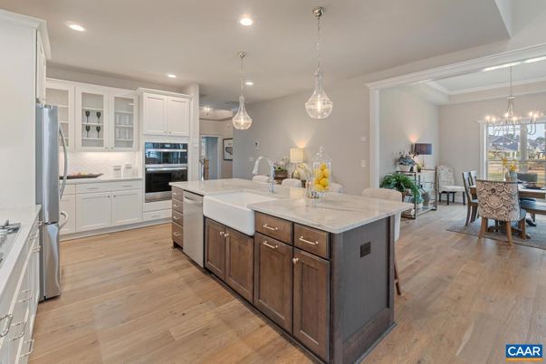 Chandelier, Dining room, Interior, Kitchen, Pendant Lights, Recessed Lighting, Stainless Steel Appliances, Wood Texture Flooring