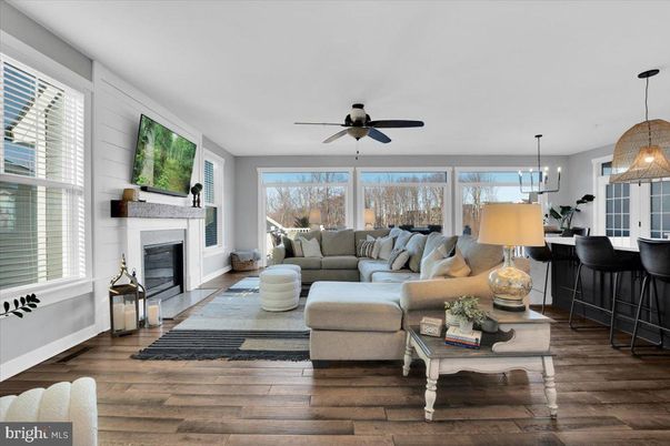 Dining room, Fireplace, Interior, Living room, Pendant Lights, Wood Texture Flooring