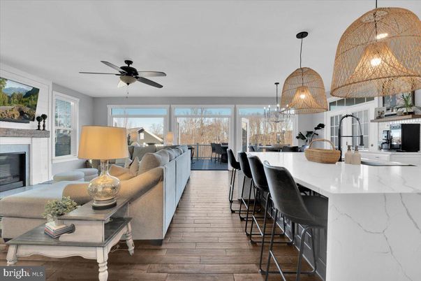 Dining room, Fireplace, Interior, Kitchen, Living room, Pendant Lights, Wood Texture Flooring