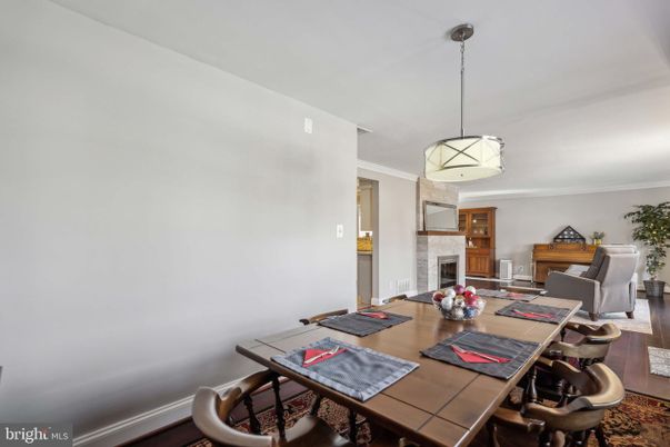 Dining room, Fireplace, Interior, Pendant Lights, Wood Texture Flooring
