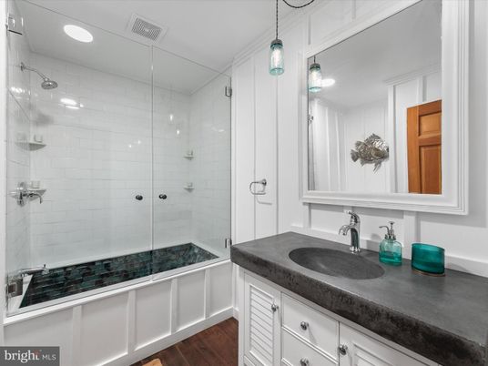 Bathroom, Glass Shower, Interior, Pendant Lights, Recessed Lighting, Wood Texture Flooring