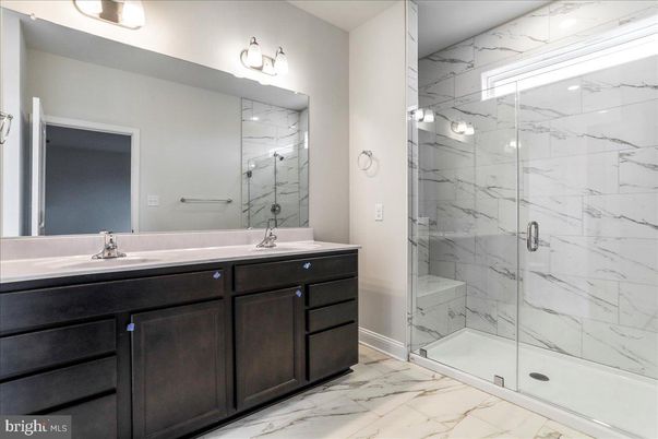 Bathroom, Dual Sink Vanities, Glass Shower, Interior, Marble, Marble Walls