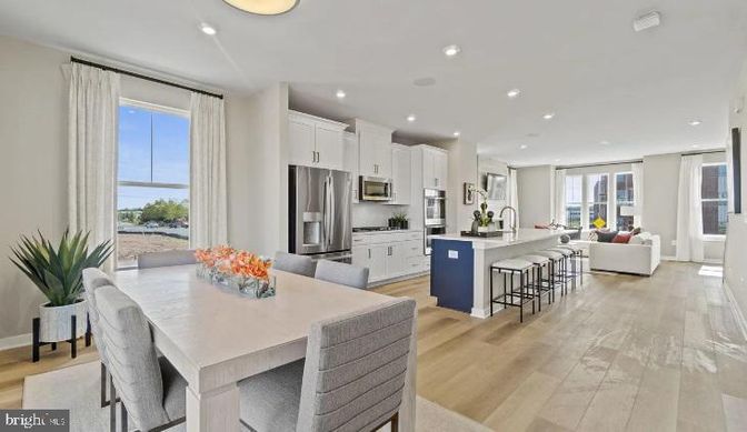Dining room, Interior, Kitchen, Living room, Recessed Lighting, Stainless Steel Appliances, Wood Texture Flooring