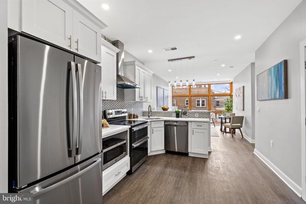 Dining room, Interior, Kitchen, Pendant Lights, Recessed Lighting, Stainless Steel Appliances, Wood Texture Flooring