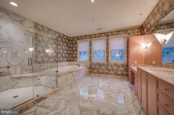 Bathroom, Dual Sink Vanities, Glass Shower, Interior, Marble, Marble Walls, Recessed Lighting