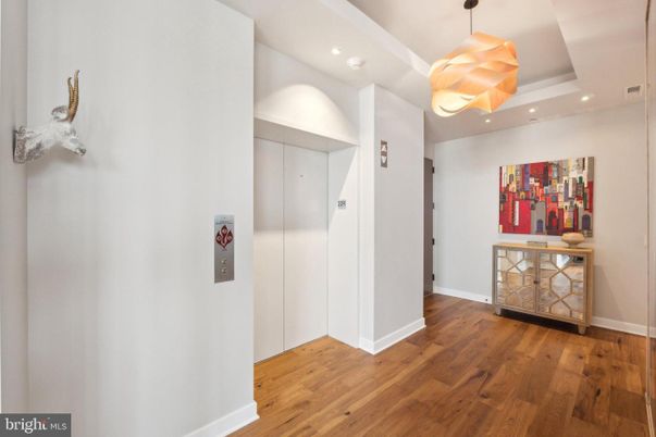 Elevator, Interior, Pendant Lights, Recessed Lighting, Wood Texture Flooring