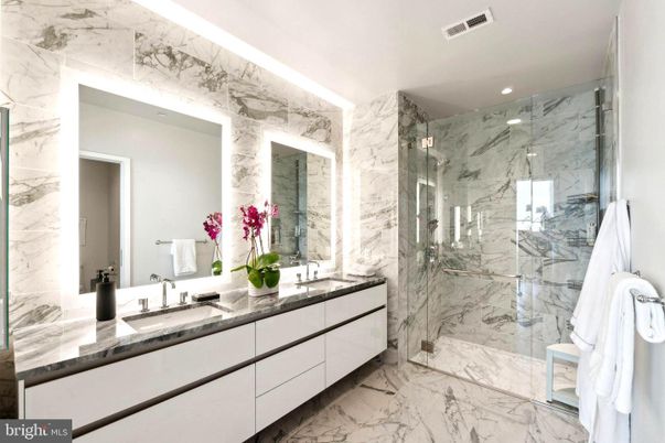 Bathroom, Dual Sink Vanities, Glass Shower, Interior, Marble, Marble Walls, Recessed Lighting