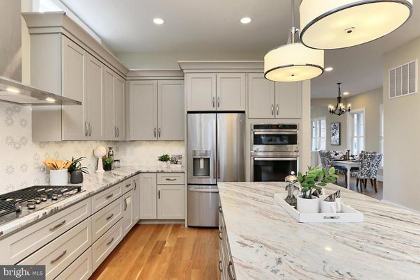 Chandelier, Dining room, Interior, Kitchen, Recessed Lighting, Stainless Steel Appliances, Wood Texture Flooring
