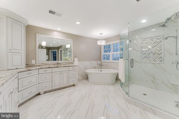 Bathroom, Dual Sink Vanities, Free Standing Baths, Glass Shower, Interior, Marble, Marble Walls, Pendant Lights, Recessed Lighting