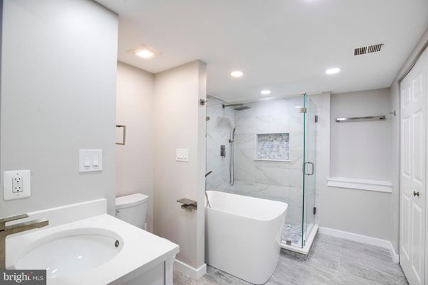 Bathroom, Free Standing Baths, Glass Shower, Interior, Marble Walls, Recessed Lighting