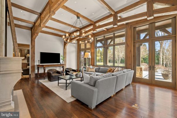 Chandelier, Fireplace, Interior, Living room, Recessed Lighting, Wooden Beams, Wood Texture Flooring