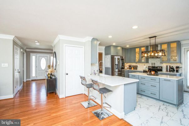 Interior, Kitchen, Marble, Pendant Lights, Recessed Lighting, Stainless Steel Appliances, Wood Texture Flooring