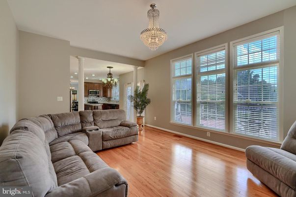 Chandelier, Interior, Kitchen, Living room, Recessed Lighting, Stainless Steel Appliances, Wood Texture Flooring