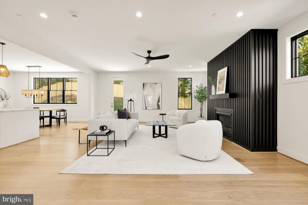 Dining room, Fireplace, Interior, Living room, Pendant Lights, Recessed Lighting, Wood Texture Flooring