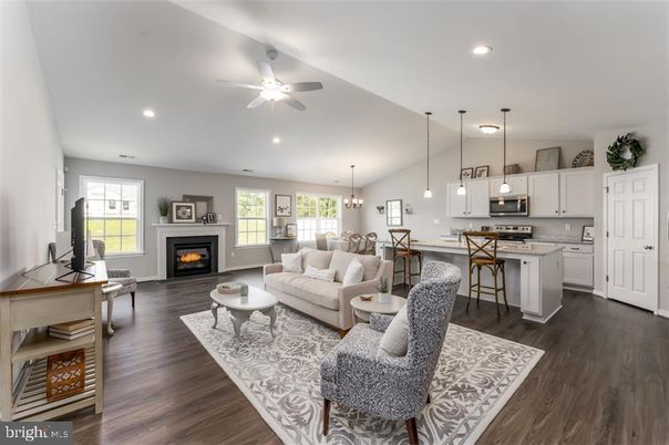Dining room, Fireplace, Interior, Kitchen, Living room, Pendant Lights, Recessed Lighting, Stainless Steel Appliances, Wood Texture Flooring