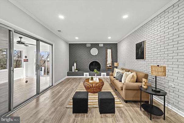 Fireplace, Interior, Living room, Recessed Lighting, Stone Walls, Wood Texture Flooring
