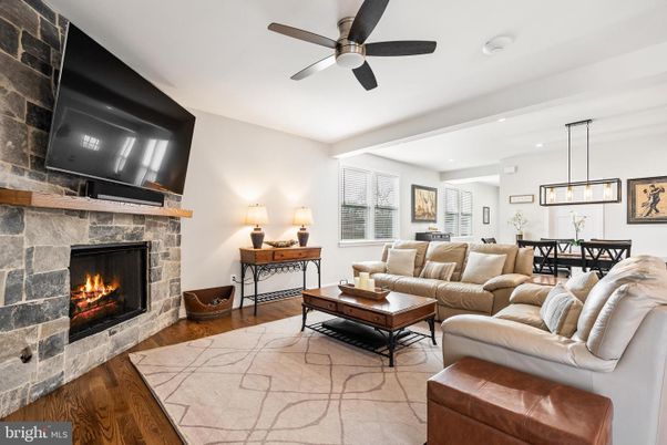 Dining room, Fireplace, Interior, Living room, Pendant Lights, Recessed Lighting, Stone Walls, Wood Texture Flooring