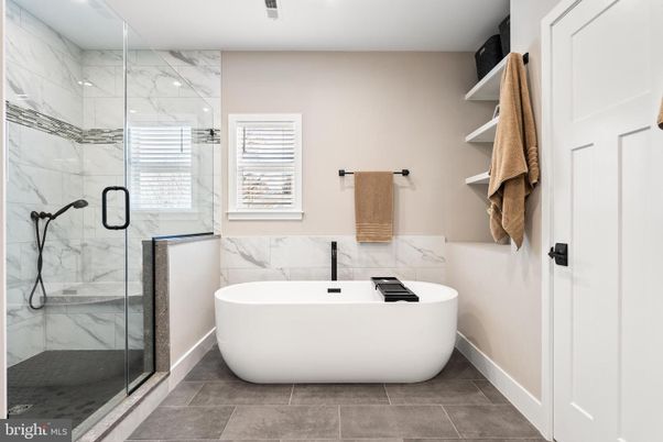Bathroom, Free Standing Baths, Glass Shower, Interior, Marble Walls, Recessed Lighting