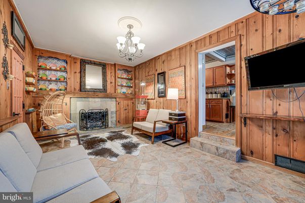Chandelier, Fireplace, Interior, Living room, Wooden Walls