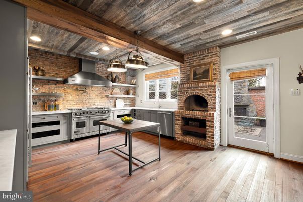 Fireplace, Interior, Kitchen, Pendant Lights, Recessed Lighting, Stainless Steel Appliances, Stone Walls, Wooden Beams, Wooden Ceilings, Wood Texture Flooring