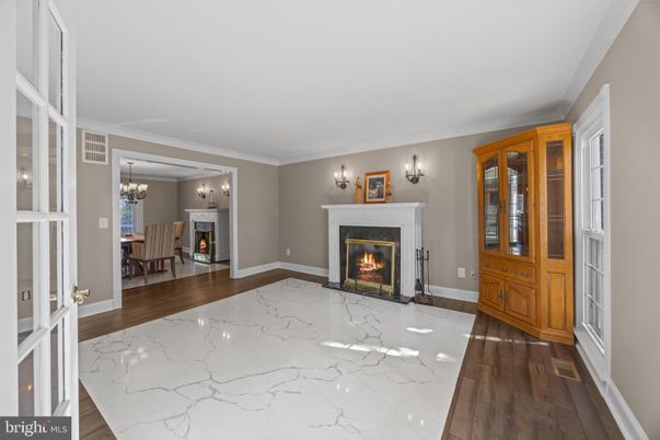 Chandelier, Dining room, Fireplace, Interior, Wood Texture Flooring
