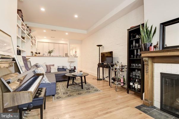 Fireplace, Interior, Living room, Piano, Recessed Lighting, Wood Texture Flooring
