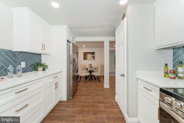 Dining room, Interior, Kitchen, Recessed Lighting, Stainless Steel Appliances, Wood Texture Flooring