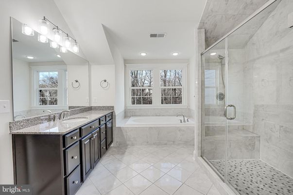 Bathroom, Dual Sink Vanities, Glass Shower, Interior, Marble Walls, Recessed Lighting