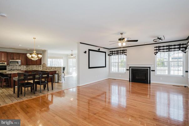 Chandelier, Dining room, Empty room, Fireplace, Interior, Kitchen, Pendant Lights, Recessed Lighting, Wood Texture Flooring
