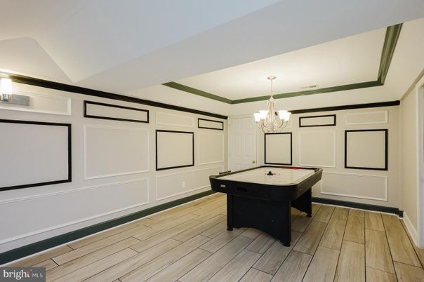 Billiard Table, Chandelier, Game Room, Interior, Projection Screen, Wood Texture Flooring