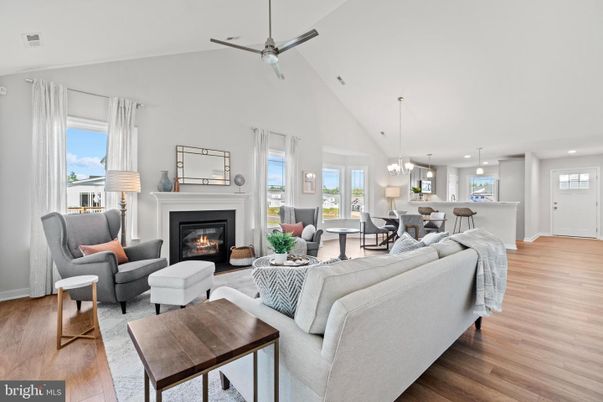 Dining room, Fireplace, Interior, Living room, Pendant Lights, Recessed Lighting, Wood Texture Flooring