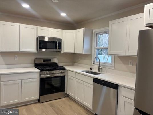 Interior, Kitchen, Recessed Lighting, Stainless Steel Appliances, Wood Texture Flooring