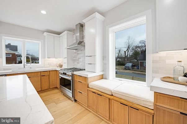 Interior, Kitchen, Recessed Lighting, Stainless Steel Appliances, Tile Countertops, Wood Texture Flooring