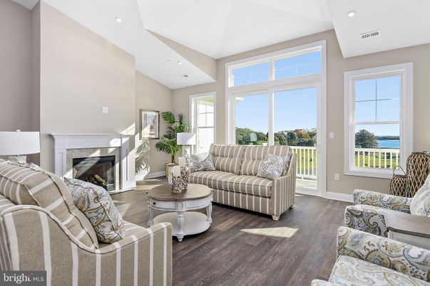 Fireplace, Interior, Living room, Recessed Lighting, Water, Wood Texture Flooring