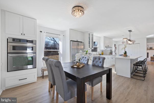 Dining room, Interior, Kitchen, Pendant Lights, Stainless Steel Appliances, Wood Texture Flooring
