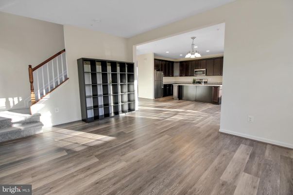 Chandelier, Interior, Kitchen, Recessed Lighting, Stainless Steel Appliances, Wood Texture Flooring