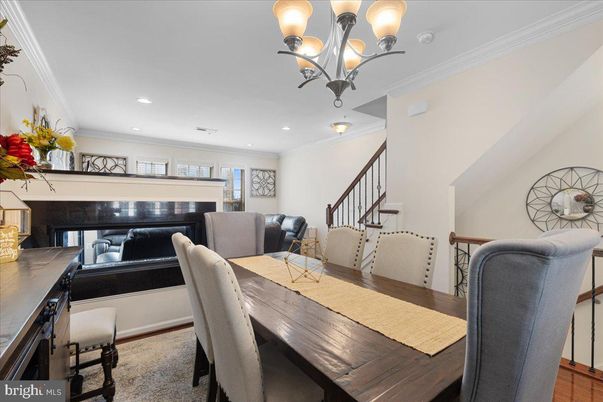 Chandelier, Dining room, Fireplace, Interior, Piano, Recessed Lighting