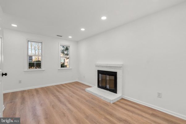 Empty room, Fireplace, Interior, Recessed Lighting, Wood Texture Flooring