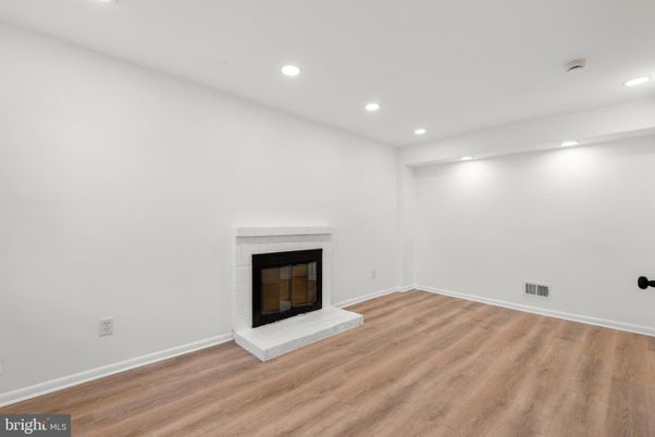 Empty room, Fireplace, Interior, Recessed Lighting, Wood Texture Flooring