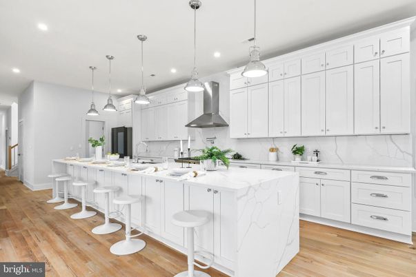 Interior, Kitchen, Marble Walls, Pendant Lights, Recessed Lighting, Wood Texture Flooring