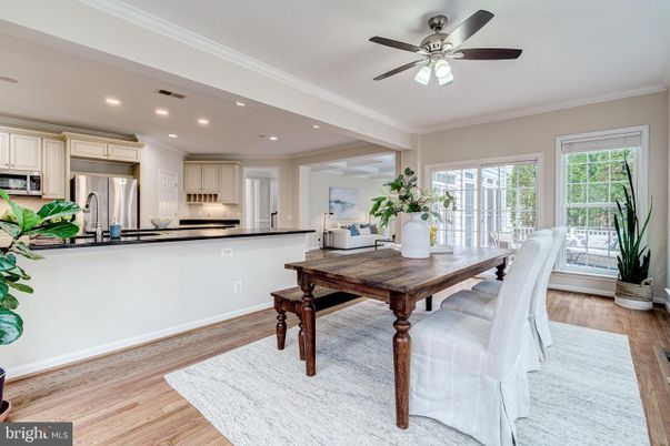 Dining room, Interior, Kitchen, Recessed Lighting, Stainless Steel Appliances, Wood Texture Flooring