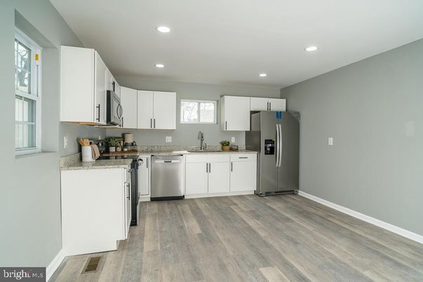 Interior, Kitchen, Recessed Lighting, Stainless Steel Appliances, Wood Texture Flooring
